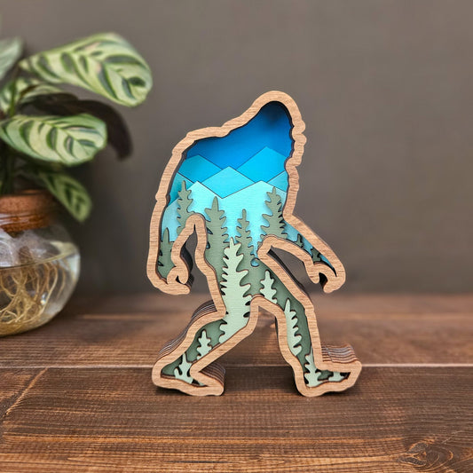3D Layered Wood Bigfoot Sasquatch Art with Mountain and Forest Landscape