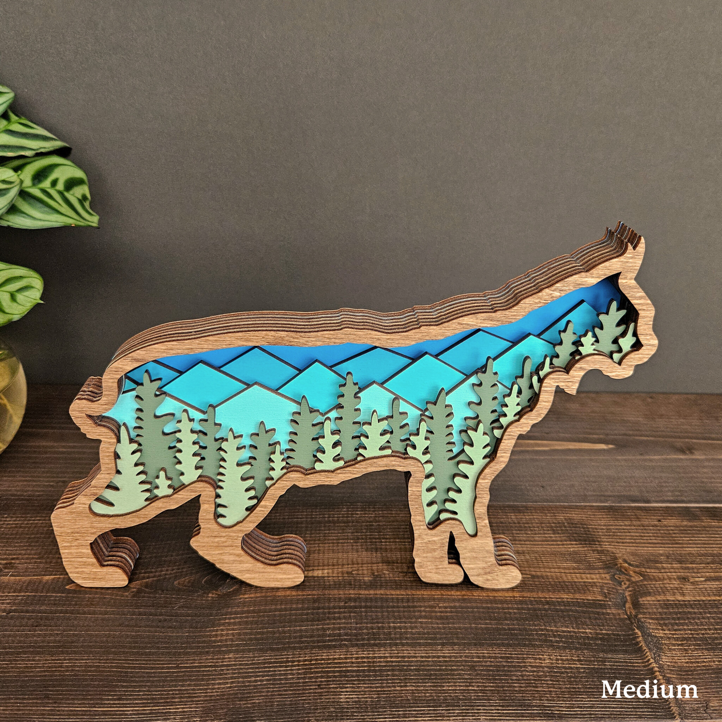 3D Bobcat Art with Mountains and Trees
