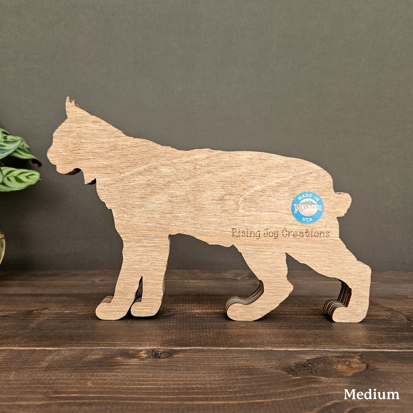 3D Bobcat Art with Mountains and Trees