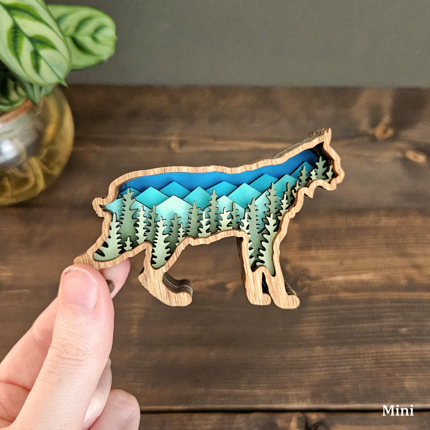 3D Bobcat Art with Mountains and Trees