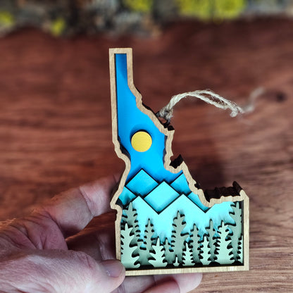 3D Layered Idaho State Ornament with Mountain Forest Scene