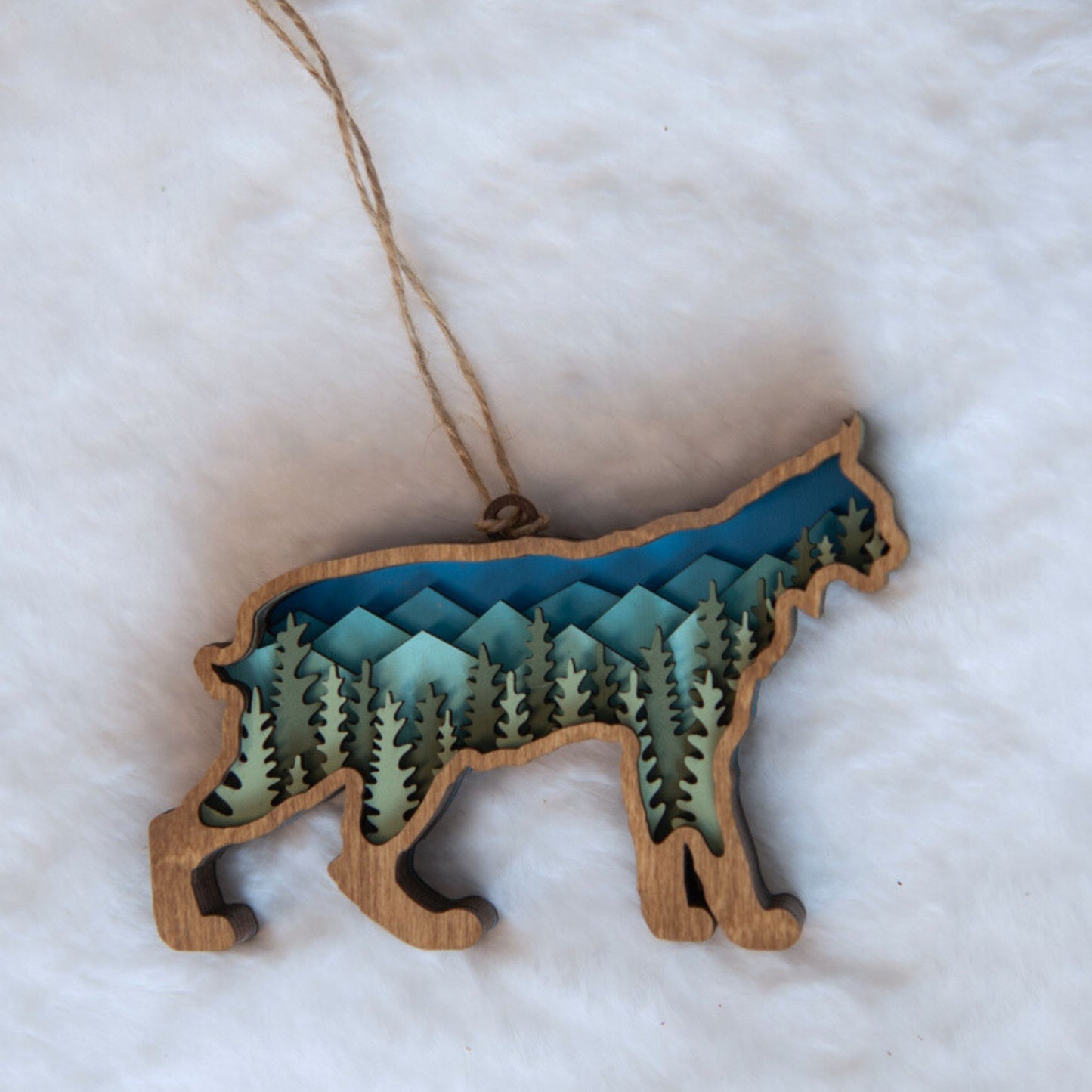 3D Bobcat Art with Mountains and Trees