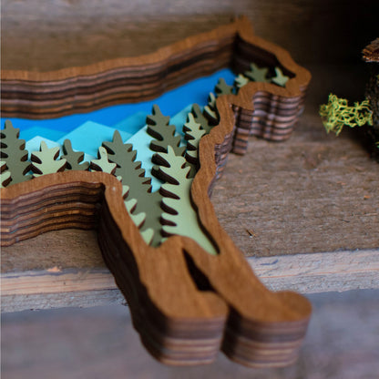 3D Bobcat Art with Mountains and Trees