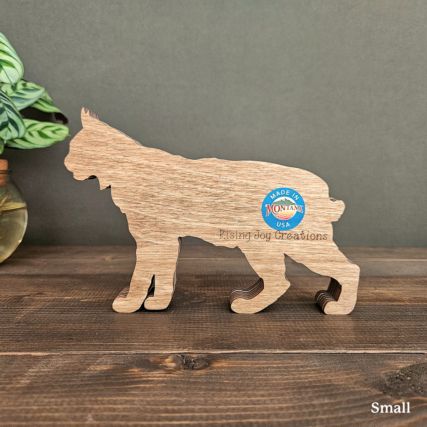 3D Bobcat Art with Mountains and Trees