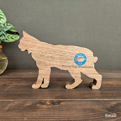 3D Bobcat Art with Mountains and Trees