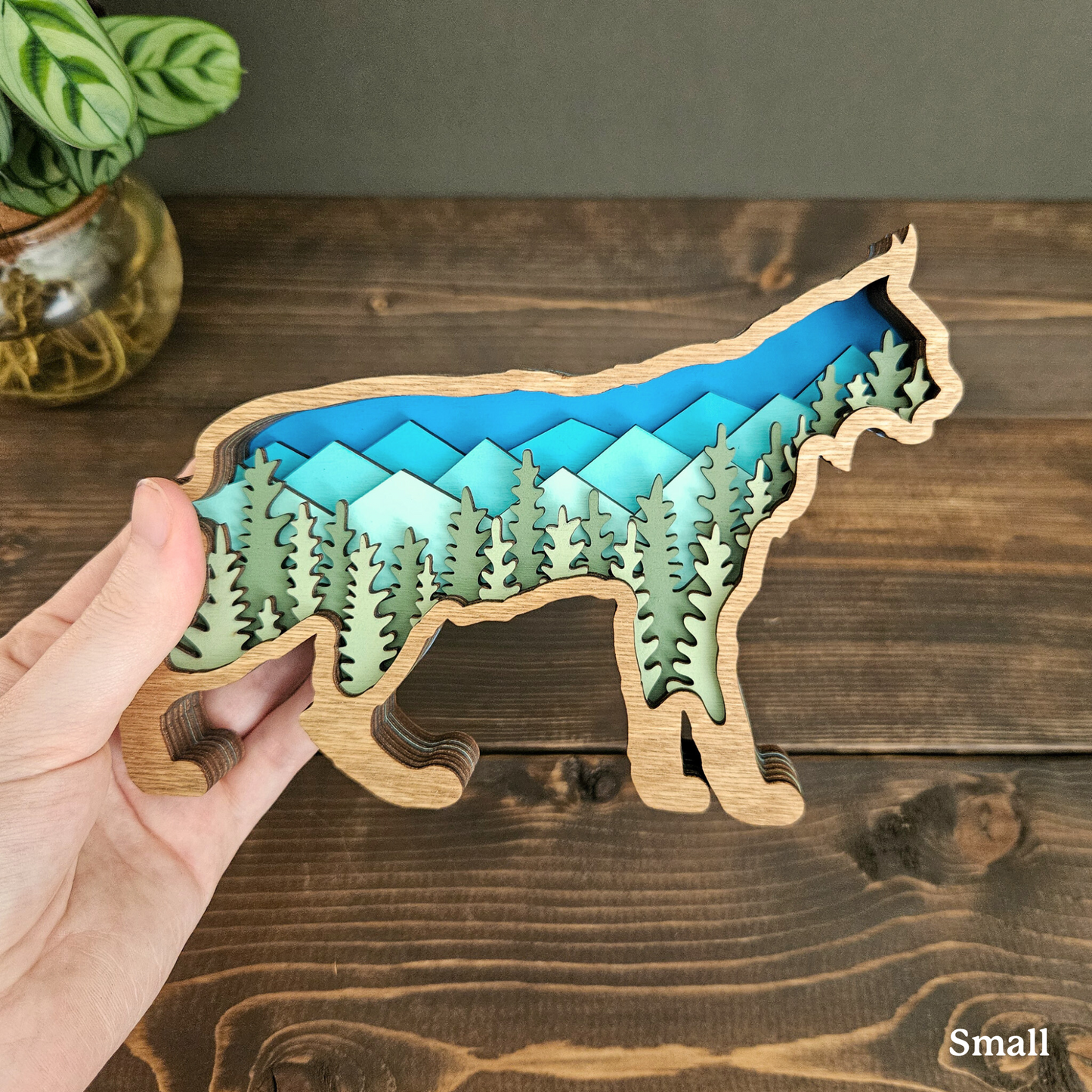 3D Bobcat Art with Mountains and Trees