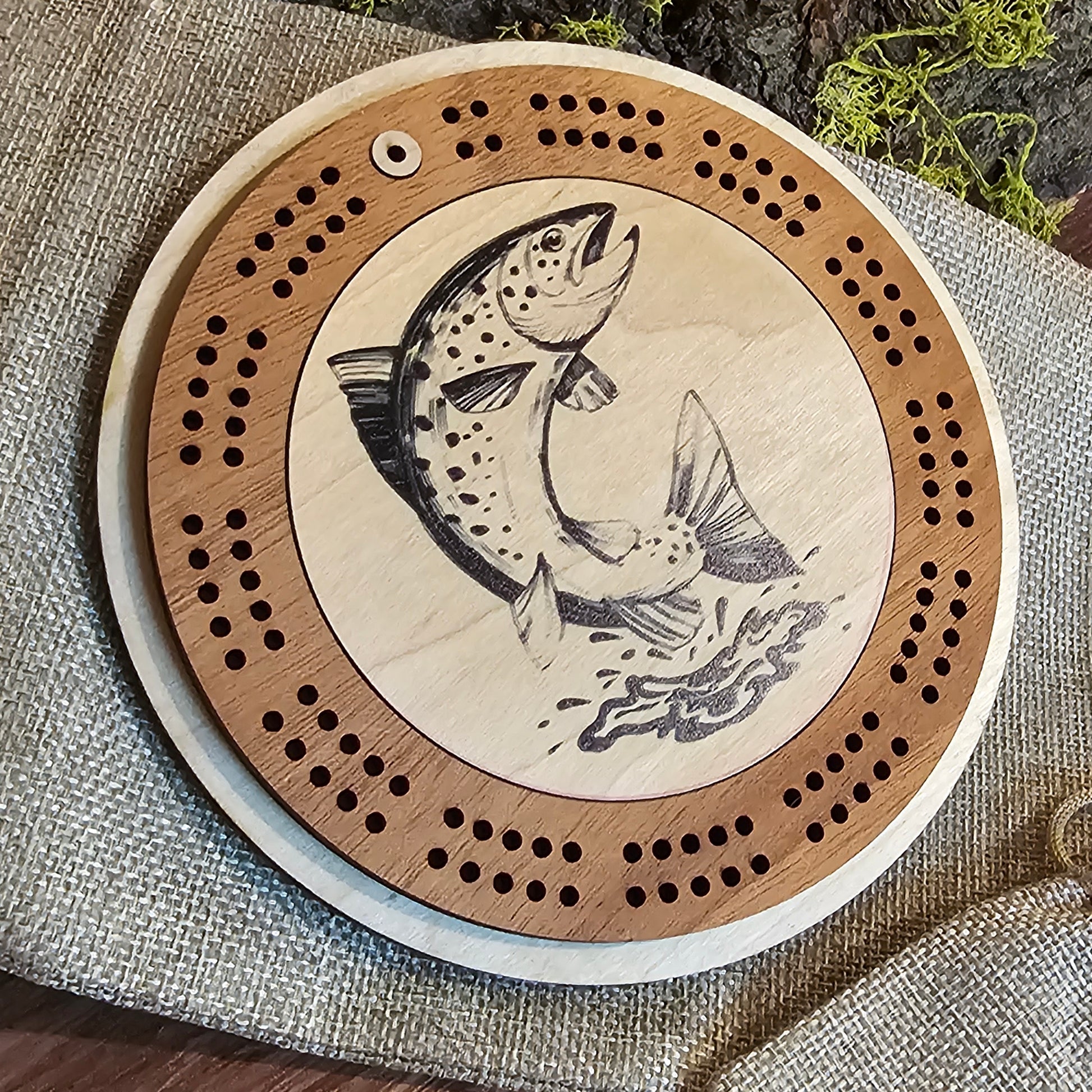Travel wooden cribbage board with fish leaping rainbow trout