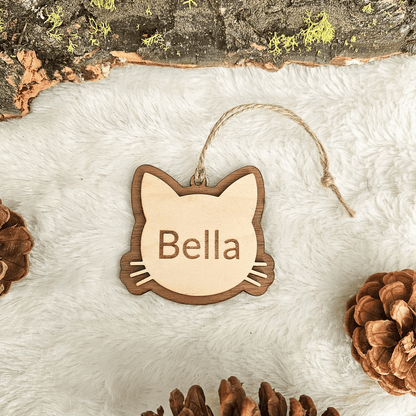 Layered wood personalized cat ornament showing engraved name Bella and handcrafted depth